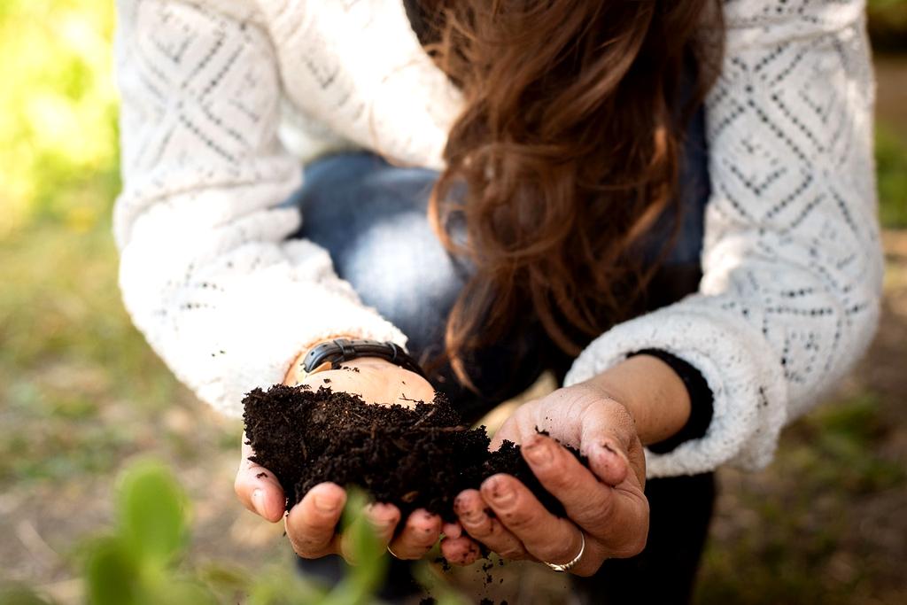 Compost bin with kitchen scraps and garden clippings